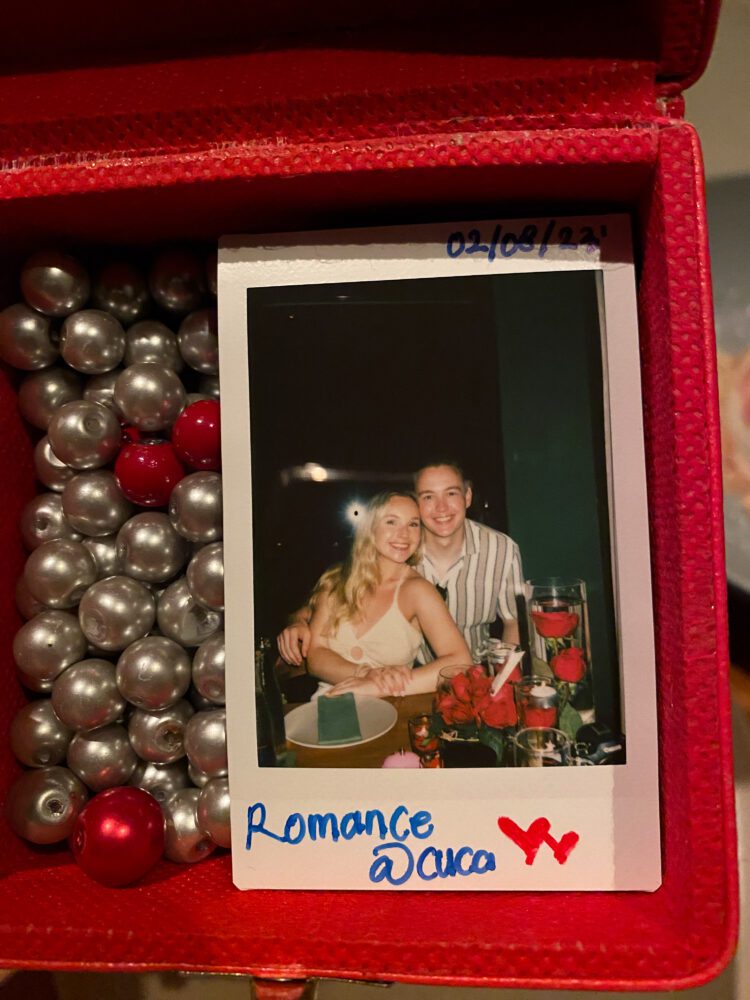 Keepsake Polaroid of a couple dining at Cuca Uluwatu, part of the restaurant’s romantic dinner experience with a red heart and handwritten date.