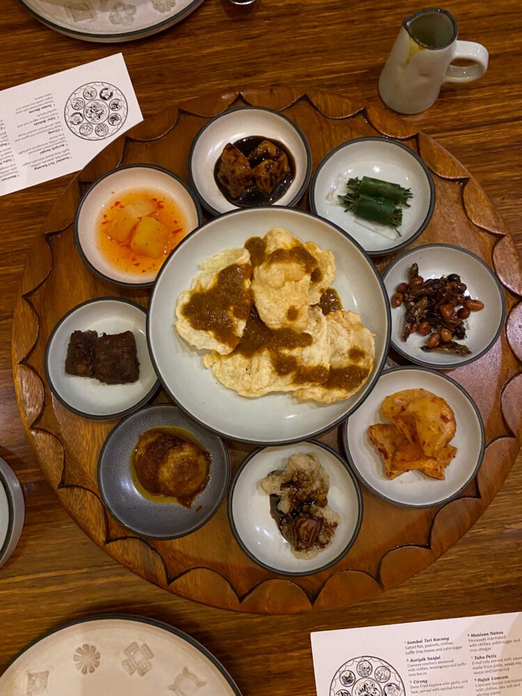 Traditional Indonesian tasting platter served at Nusantara restaurant in Ubud featuring sambals and local delicacies.