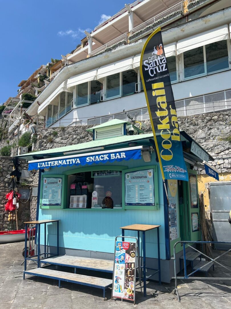 L’Alternativa is a no-frills snack and cocktail bar near the Positano beach, offering budget-friendly drinks and quick bites with a laid-back, casual vibe.